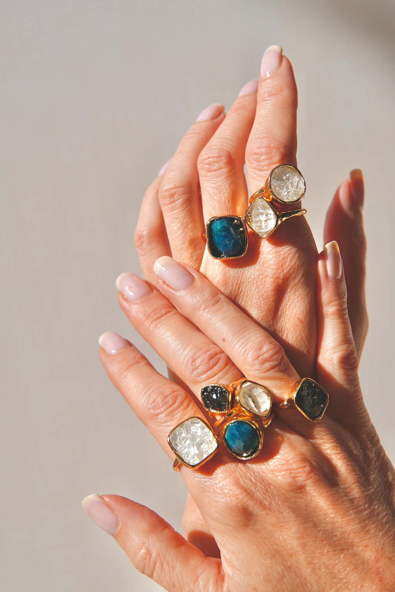 Pluma gemstone rings styled on hand